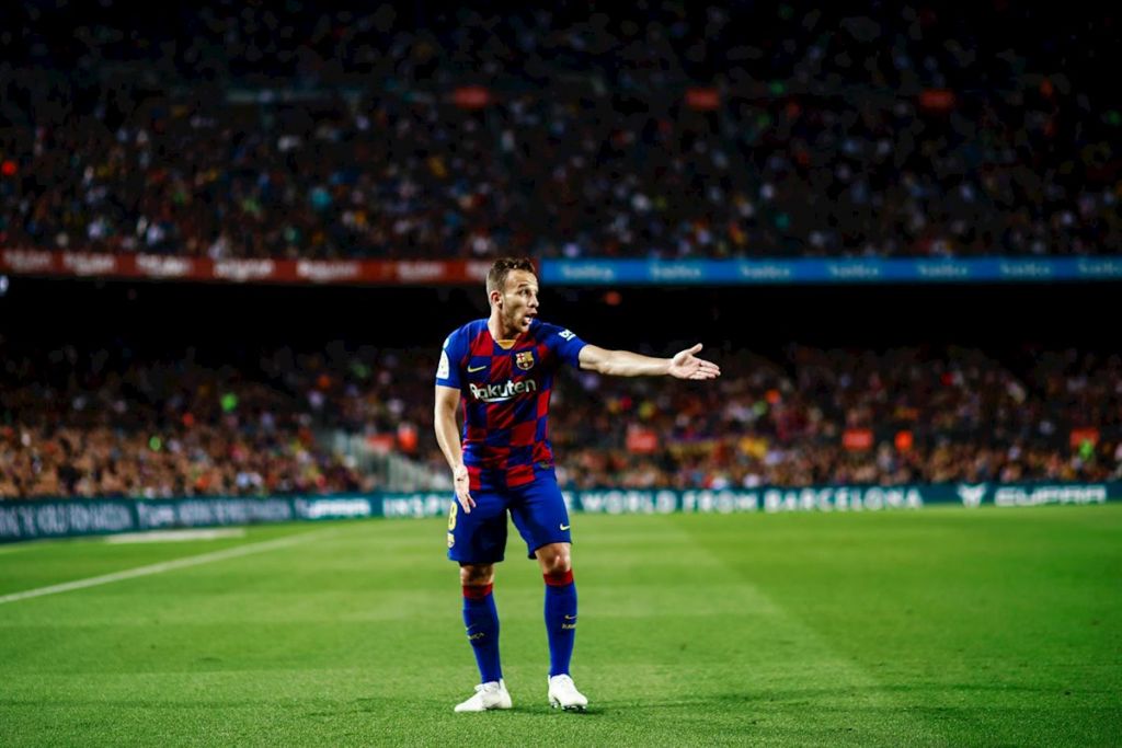 Arthur Melo y Gerard Piqué