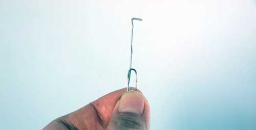 Doblar clip para abrir candado