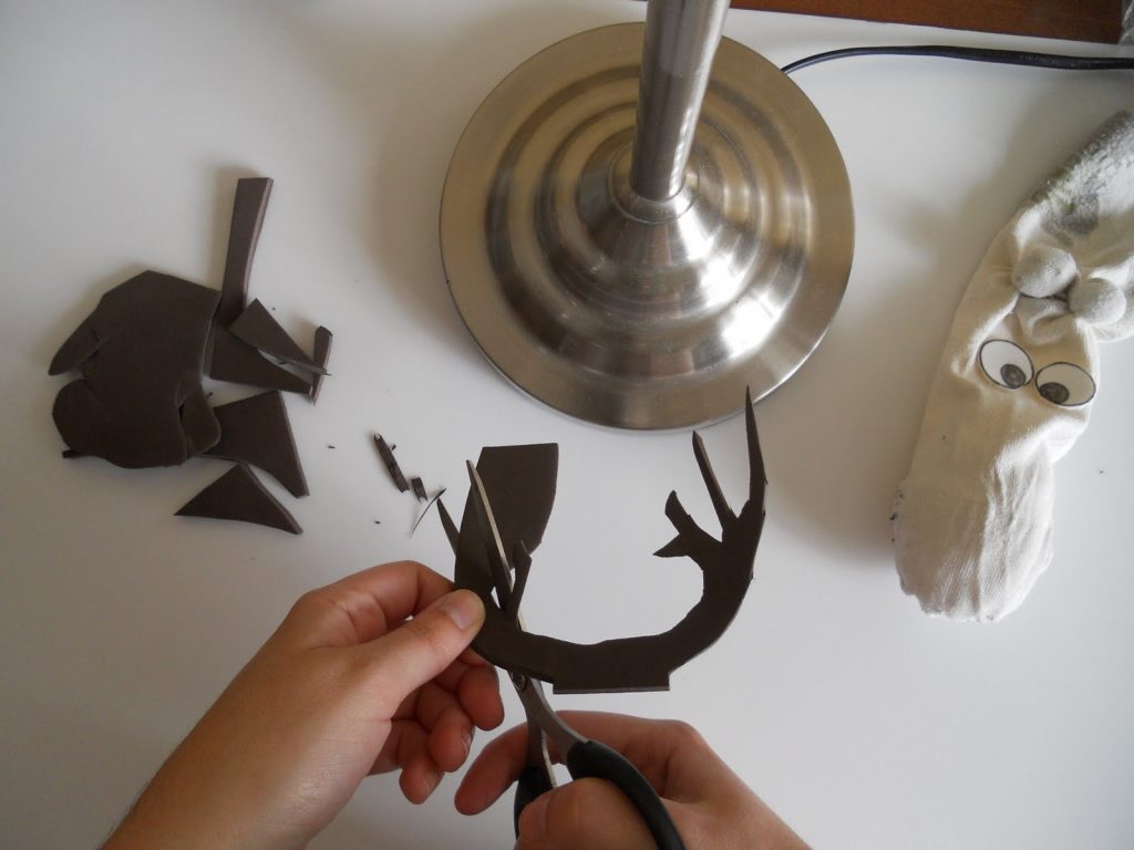 Una marioneta en calcetín del reno de Papá Noel