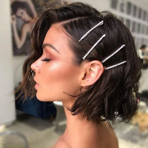 Usa una horquilla o gancho para sujetar las mascarillas