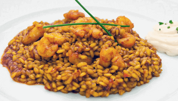 Arroz a banda: así puedes prepararlo al estilo tradicional valenciano 54 Hablemos de la historia del arroz a banda