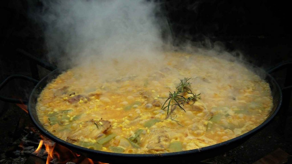 Cómo hacer una paella de escándalo en una olla exprés 7 Paella receta fuego de leña