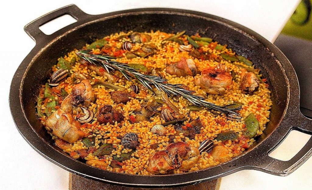Cómo hacer una paella de escándalo en una olla exprés 10 Paella tradicional
