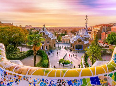 View of the city from Park Guell in Barcelona, Spain with moving clouds.