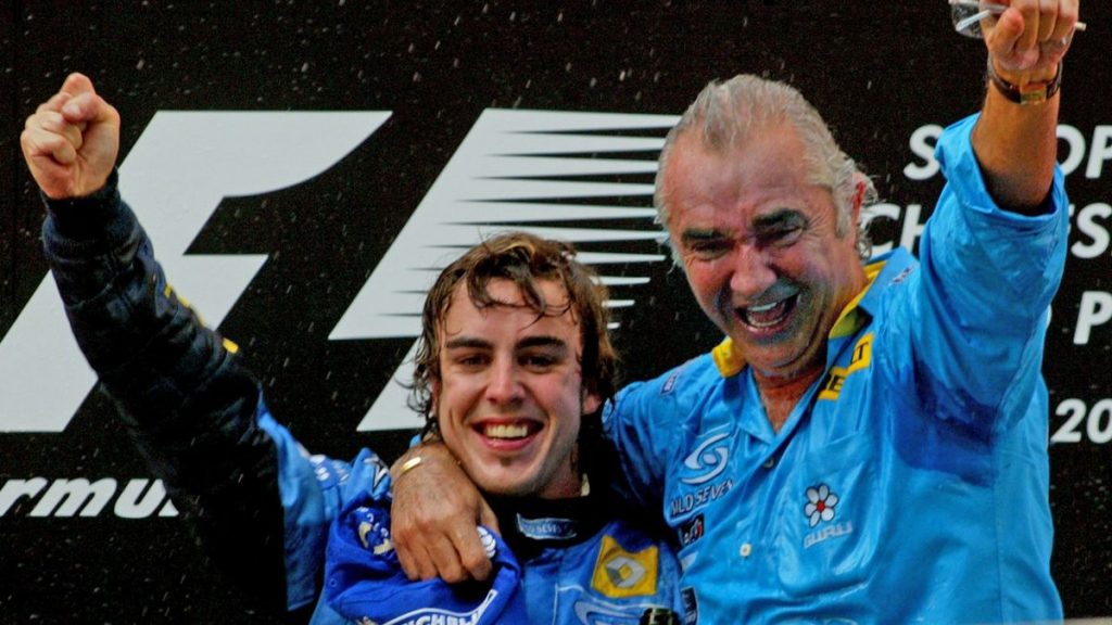 Alonso y Briatore en el podio