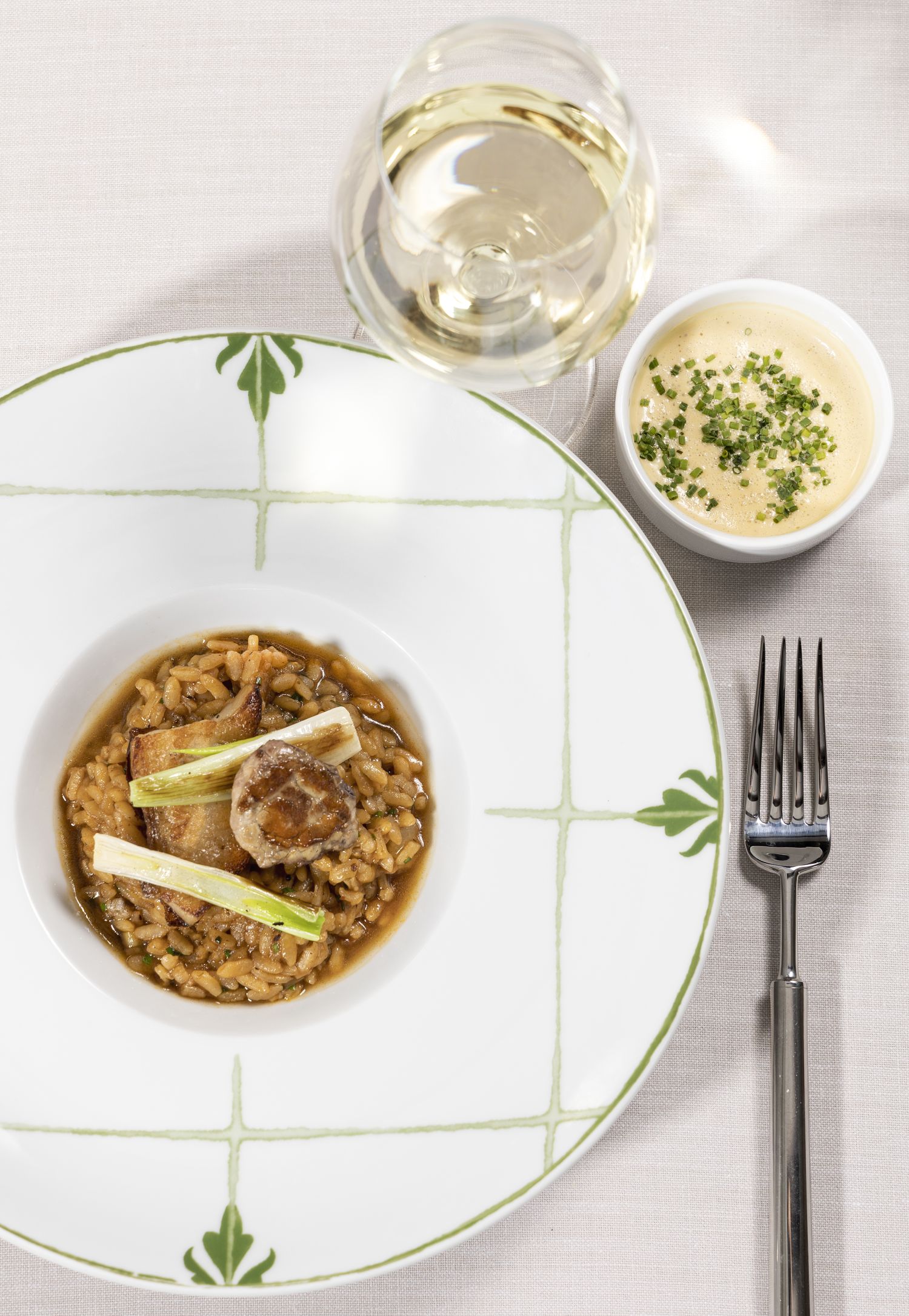 Balausta. Arroz meloso con papada y castanuela de cerdo iberico