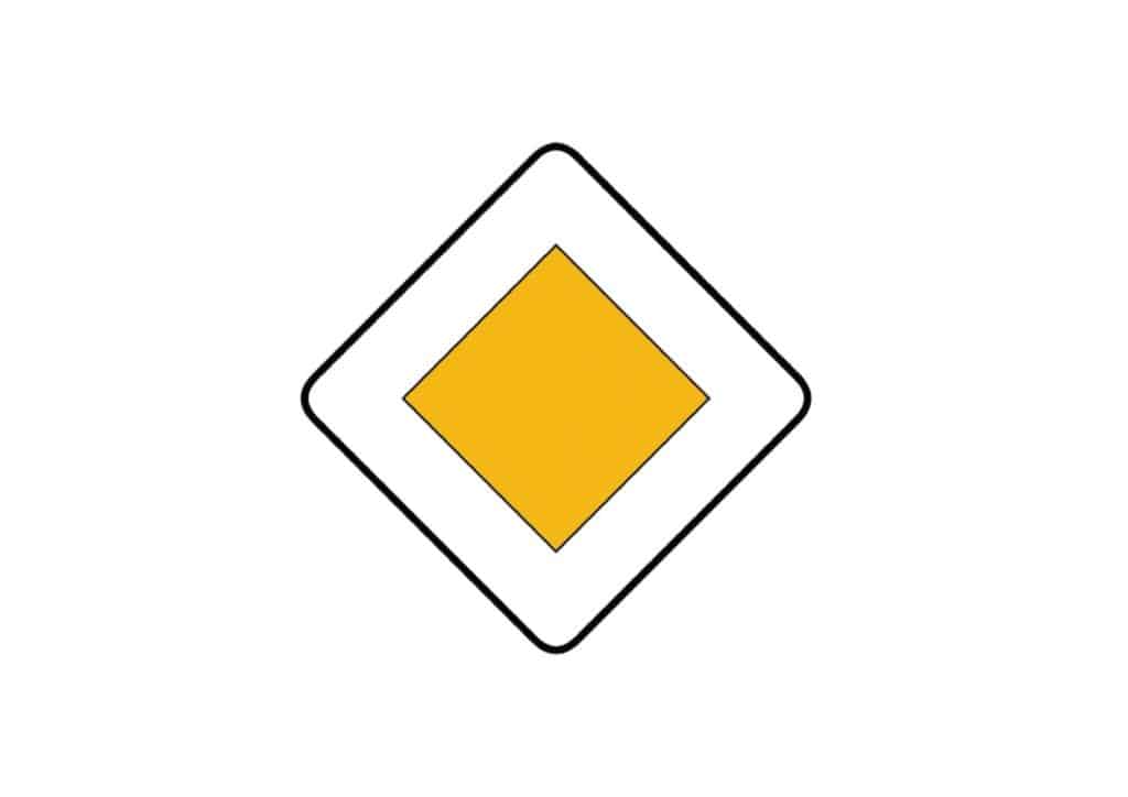 Señal de rombo con blanco y amarillo