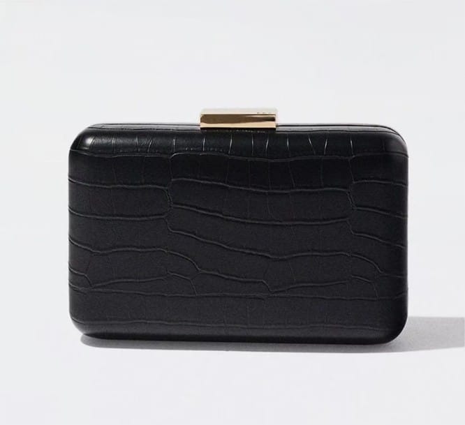 Bolso de fiesta convertible a bandolera estilo clutch liso en negro