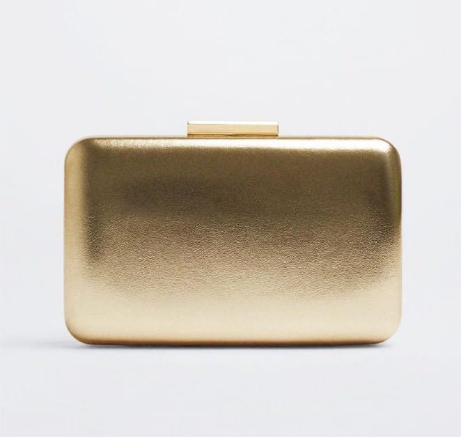 Bolso de fiesta estilo clutch convertible a bandolera y cierre de botón en dorado el corte ingles