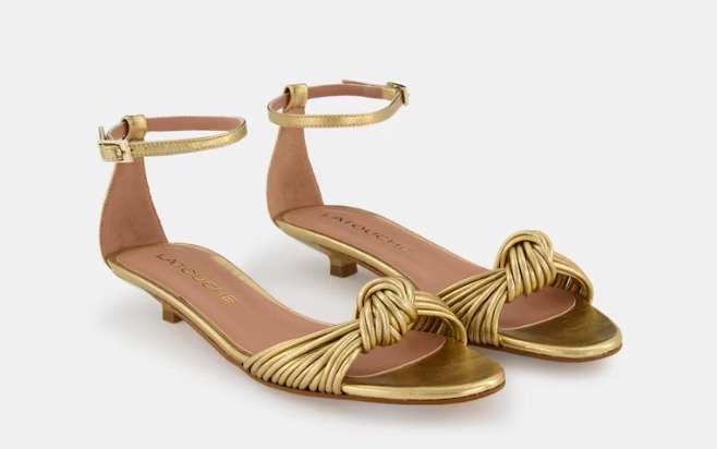 Zapatos planos y elegantes de El Corte Inglés por menos de 60 euros 2 Sandalias planas de mujer con puntera redonda, tiras finas anudadas y pulsera al tobillo con hebilla