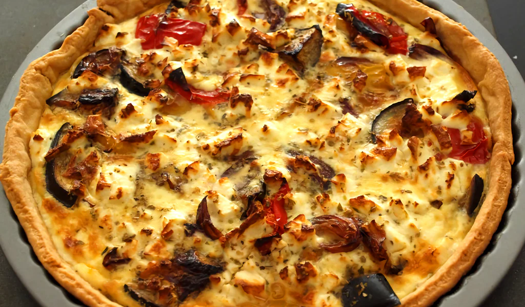 Tarta salada de berenjena, tomate y queso