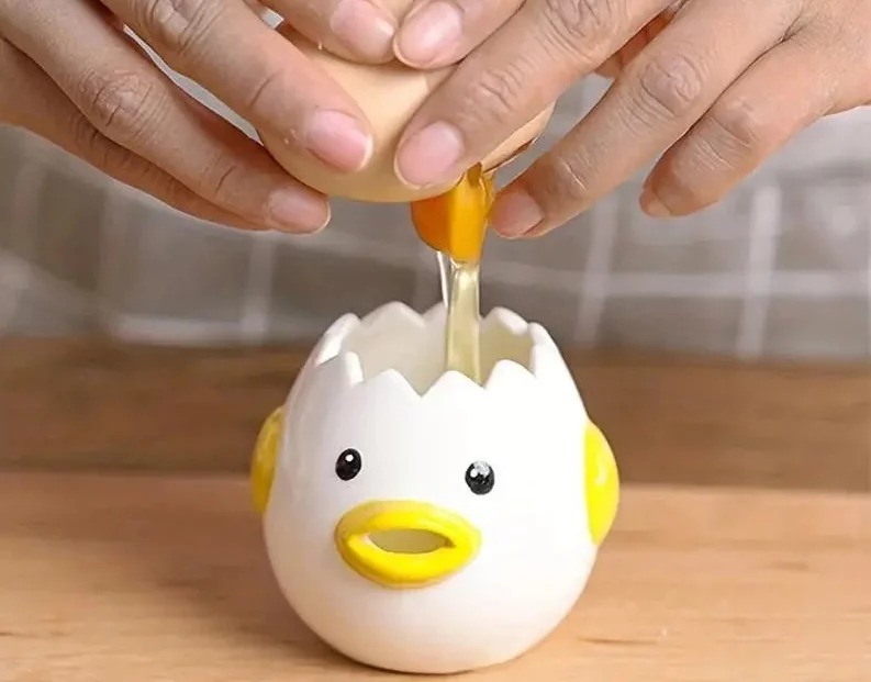 Separador de yemas en forma de pato