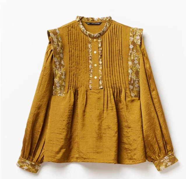 8 blusas de Sfera que puedes combinar con vaqueros para verte elegante en segundos