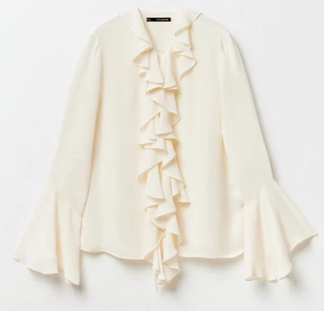 blusa blanca con volantes