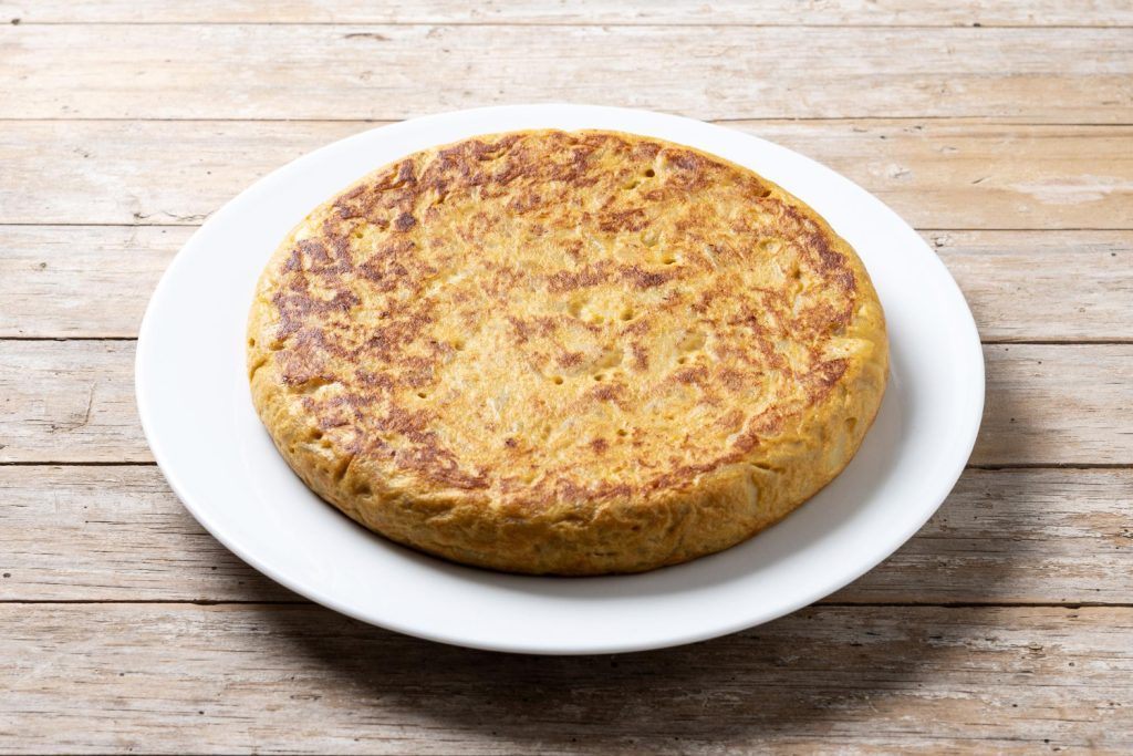 Exploramos la clave de su textura, ese interior fundente que la convierte en un plato absolutamente icónico de Galicia. Fuente: Freepik 
