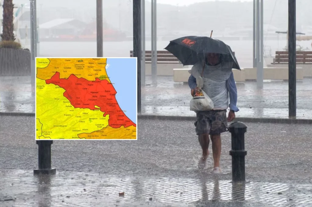 Las alertas meteorológicas consiguen el efecto contrario y crece la desconfianza en la AEMET y Protección Civil 2 Alerta roja de la AEMET en Valencia y una mujer en Ibiza caminando bajo la lluvia