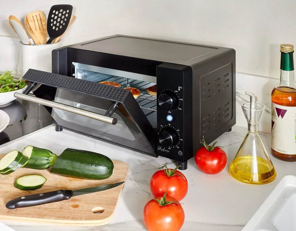 ¿Horno o freidora de aire? El electrodoméstico que te está arruinando sin que lo sepas… y no es el que crees 3 El horno tradicional y su gasto energético