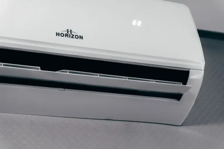 White air conditioner unit displaying 22 degrees