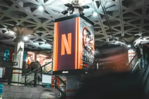A large netflix sign hangs in a public space
